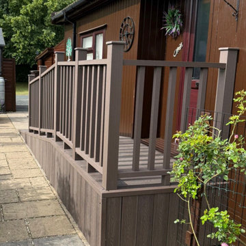 Composite Veranda and Steps Beside a Paved Path