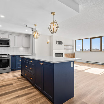 Condo renovation with eye catching blue cabinets