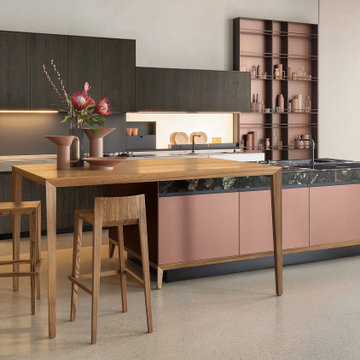 Cuisine haut de gamme rose mat avec îlot central