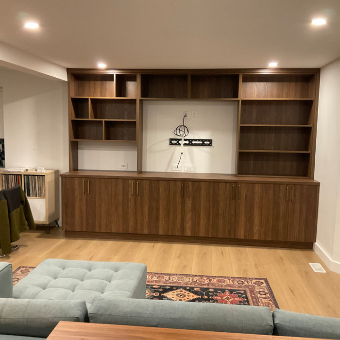 Contemporary media console with storage cabinets and integrated TV mount area