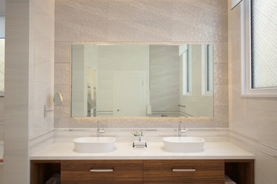 Example of a mid-sized trendy home design design in Other