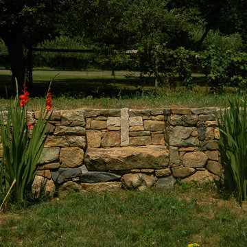 Stone cross, dry laid stone wall