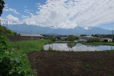 他の地域にあるおしゃれな家の外観の写真