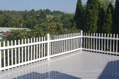 Dock - mid-sized contemporary backyard dock idea in Other with no cover