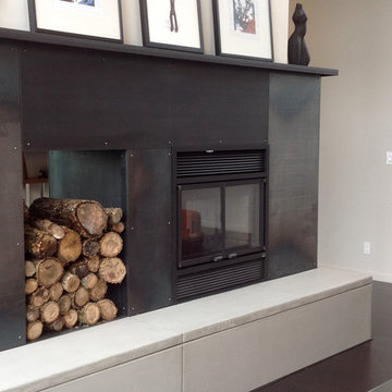 Steel panel wood burning two sided fireplace