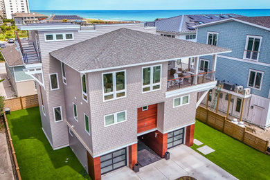 Example of a beach style exterior home design in Other