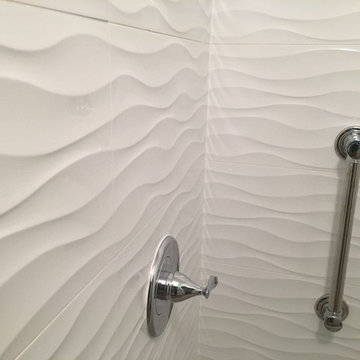 Fiberglass shower replacement with tile shower.