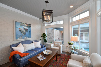 Sunroom - tropical gray floor sunroom idea in Charlotte