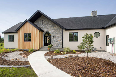 Inspiration for a farmhouse exterior home remodel in Edmonton