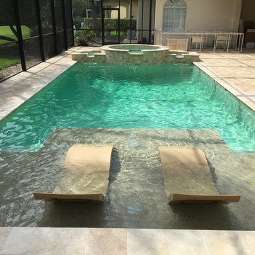Complete Renovation adding a spa and Sunshelf,kitchen,vein cut Ivory Travertine