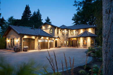 Tuscan home design photo in Vancouver