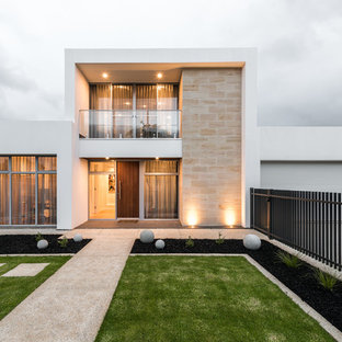 Inspiration for a contemporary one-storey stucco white house exterior in Adelaide with a flat roof.