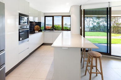 Design ideas for a beach style kitchen in Sunshine Coast.