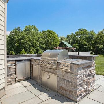 Warren, NJ Beautiful transformation - Blue stone patio with pergola and fire pit
