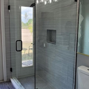 90 Degree Frameless Shower with Matte Black Hardware