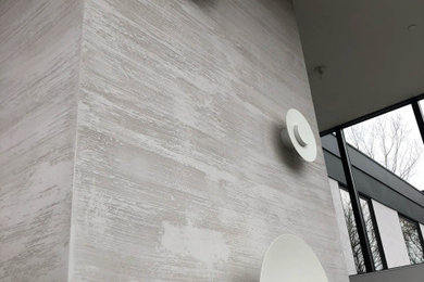 Horizontal lime plaster application on elevator walls