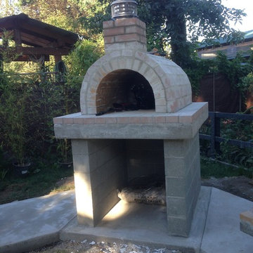 The Castillo Family Wood Fired Pizza Oven & La Caja Style Pig Roaster in WA