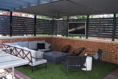 Patio - mid-sized contemporary backyard patio idea in Chicago with a fire pit, decking and a pergola