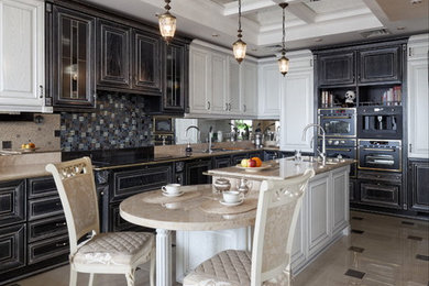 This is an example of a traditional l-shaped kitchen in Moscow with black cabinets, black appliances, with island and beige floor.