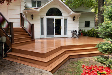 Inspiration for a large timeless backyard deck remodel in New York