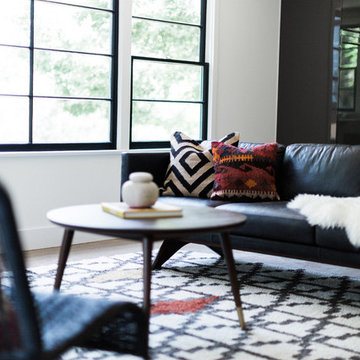 Licorice Sofa with Red Orange Pillow, Mid Century Modern Coffee Table