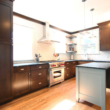 Full Wall of White Subway Tile with Soapstone Countertop