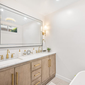 Gold, Grey, and White Bathroom Remodel