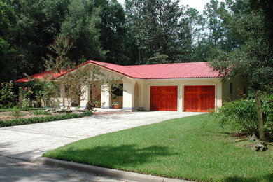 Example of a tuscan home design design in Miami