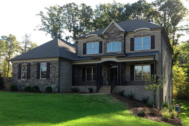 Example of a transitional exterior home design in Other