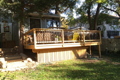 Side yard deck photo in Other with no cover