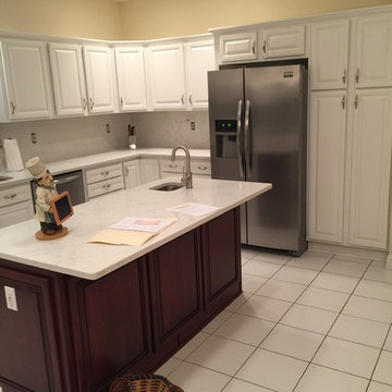 cabinet refacing--2 toned white with cherry island and quartz countertops