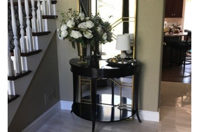 Small trendy porcelain tile and beige floor hallway photo in Other with brown walls