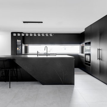 Sombre Luminis- Modern Style All Black Kitchen with Feature Stone Splash Back |