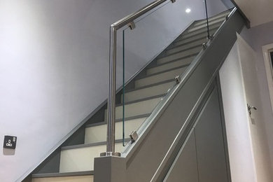 This is an example of a contemporary staircase in Other.