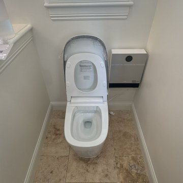 Curd-less walk-in shower; heated floors in bathroom + shower+bench LED
