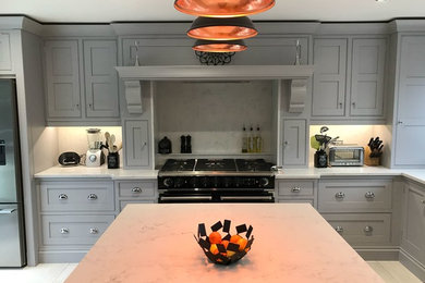 This is an example of a transitional kitchen in Essex.