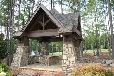 Example of an eclectic exterior home design in Raleigh