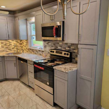 Gray Shaker Kitchen with Mosaic Backsplash in Staten Island, NY