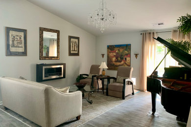 Living room - mid-sized eclectic vinyl floor living room idea in Other