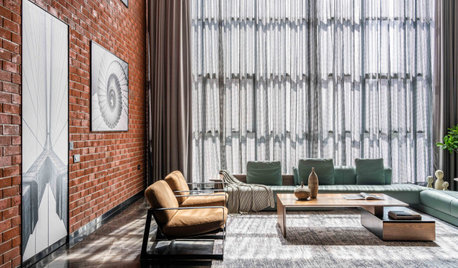 Surat Houzz: Bare Brick and Exposed Finishes Complete This Home