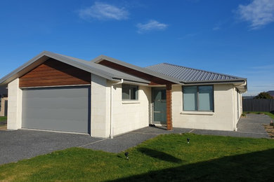 Example of a trendy exterior home design in Dunedin