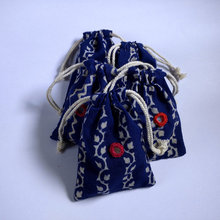 Custom made natural dyed indigo drawstring bags with mirror embroidery
