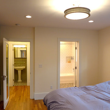 Master bedroom with new master bath access and nearby powder room