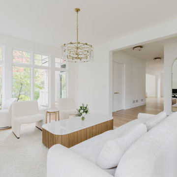Open Concept Living Room with Arched Doorways and Bespoke Minimalist Touches
