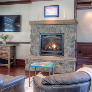 Moss Rock Fireplace with Reclaimed Rustic Oak Mantel