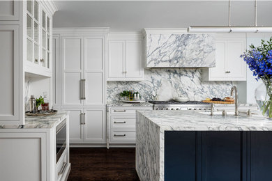 Inspiration for a large timeless u-shaped open concept kitchen remodel in New York with an undermount sink, recessed-panel cabinets, white cabinets, marble countertops, multicolored backsplash, marble backsplash, paneled appliances, an island and multicolored countertops