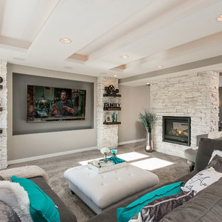 This is an example of a medium sized contemporary look-out basement in Minneapolis with beige walls, bamboo flooring, no fireplace and brown floors.
