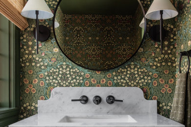 Powder room - mid-sized contemporary wallpaper powder room idea in New York with open cabinets, green walls, an undermount sink, quartz countertops, white countertops and a floating vanity