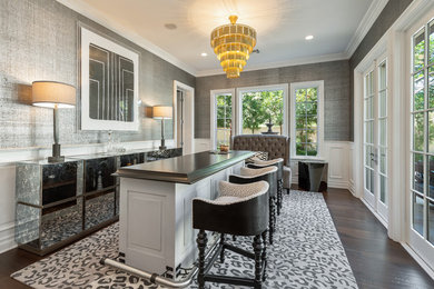 Example of a large trendy galley dark wood floor and brown floor seated home bar design in San Diego with gray cabinets, marble countertops and brown countertops