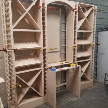Custom wine pour station with storage.